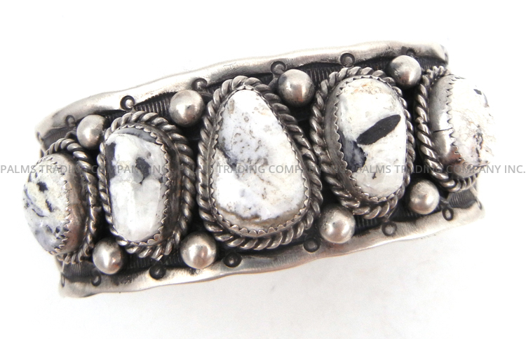 Navajo White Buffalo and sterling silver row cuff bracelet by Elroy Chavez