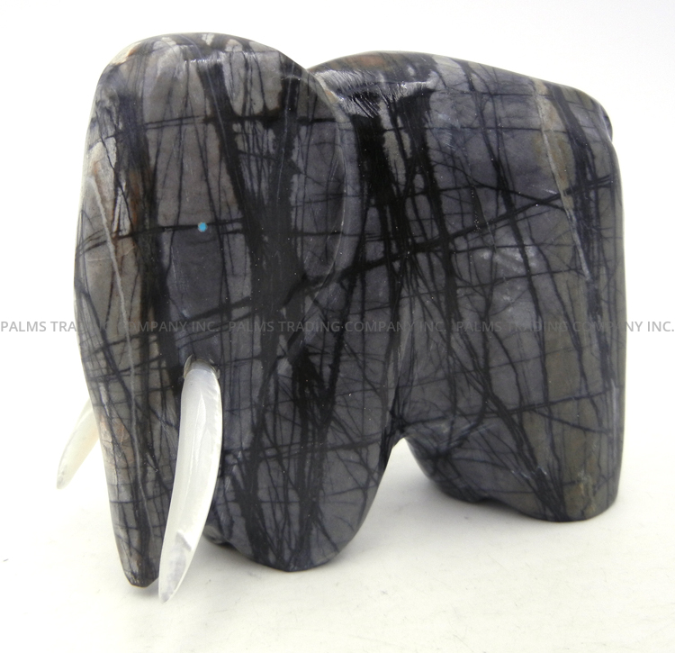 Zuni carved picasso marble elephant fetish with mother of pearl tusks by Calvert Bowannie