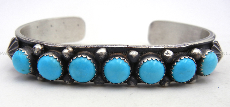 Navajo turquoise and brushed sterling silver row cuff bracelet by Kevin Billah