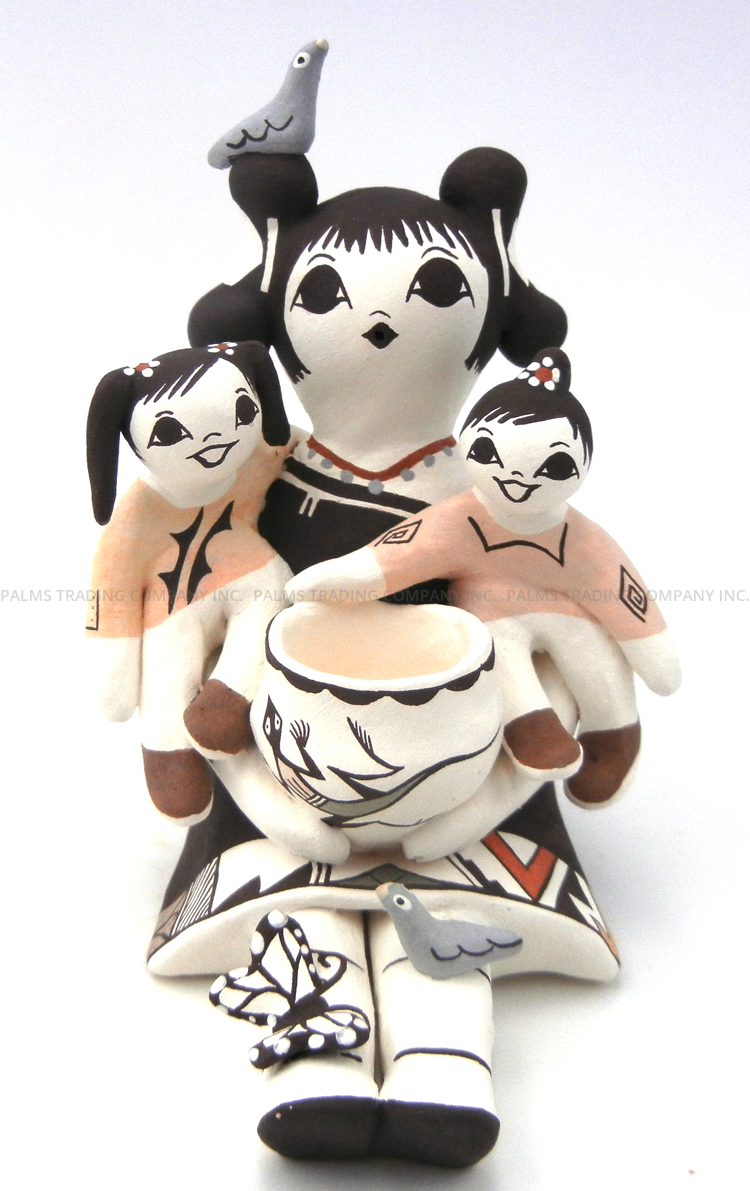 Acoma handmade and hand painted seated female storyteller figurine with two girls, birds and butterfly by Judy Lewis