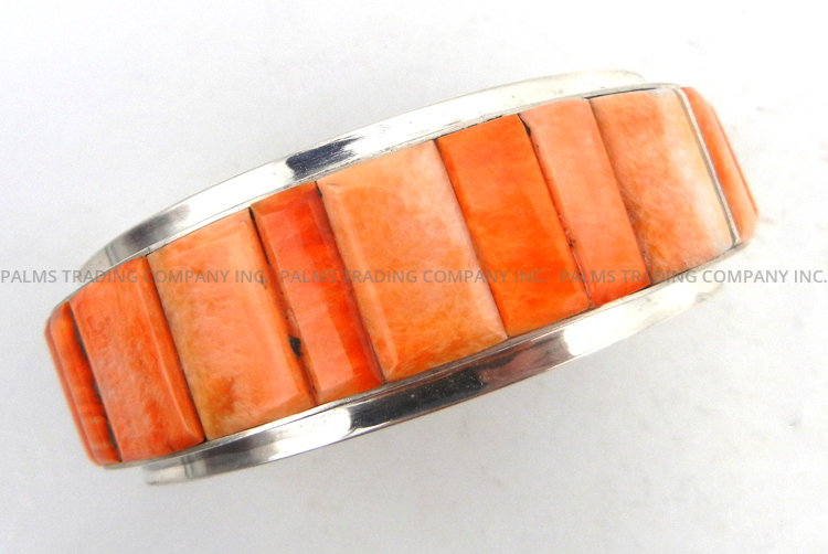 Navajo orange spiny oyster shell and sterling silver cornrow inlay cuff bracelet by Harold Smith