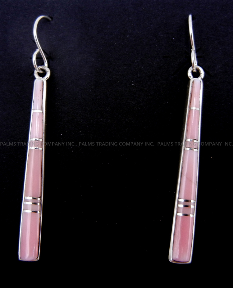 Navajo pink conch and sterling silver channel inlay dangle earrings by Rick Tolino