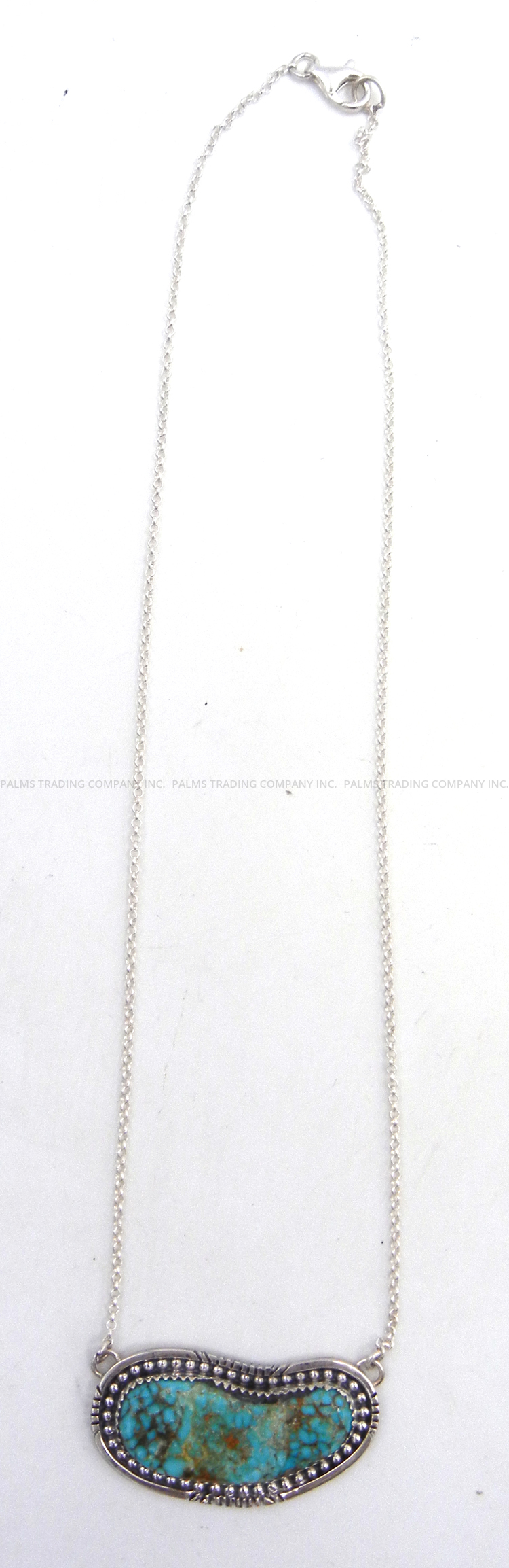 Navajo turquoise and sterling silver bar necklace by Ted Secatero