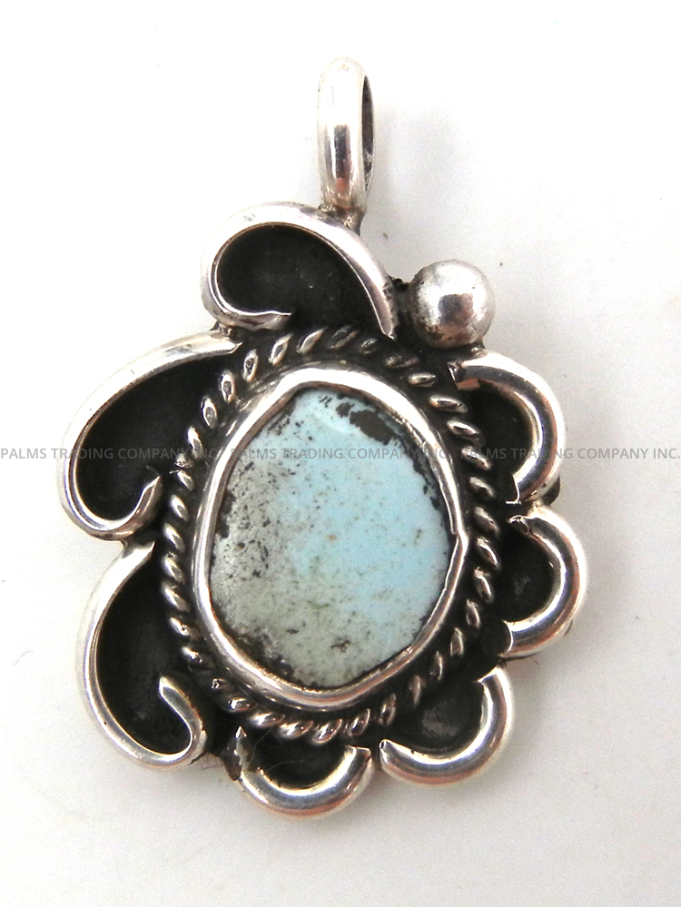 Navajo small dry creek turquoise and sterling silver pendant by Juan Guerro