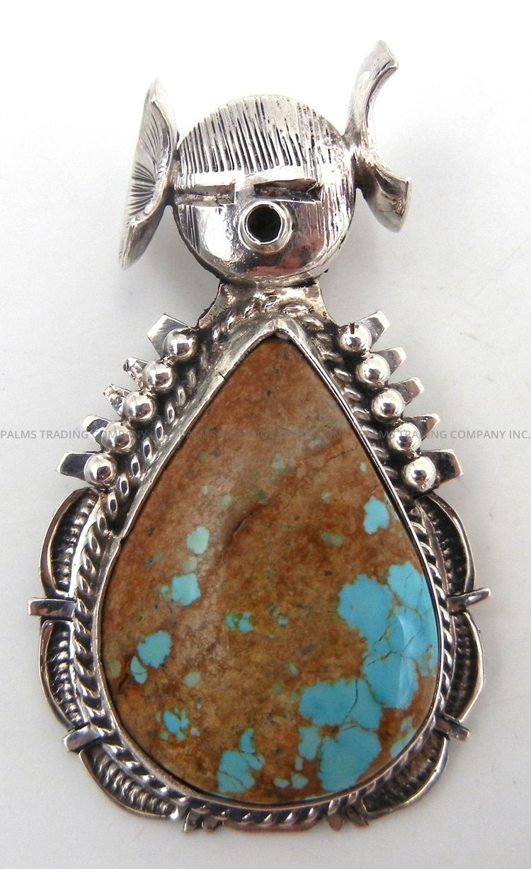 Navajo boulder turquoise and sterling silver maiden pendant by Bennie Ration