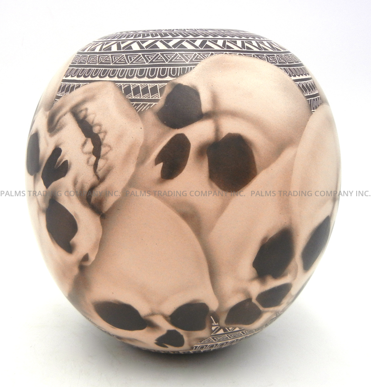 Mata Ortiz handmade, painted and etched black and white skull jar by Hilario Quezada