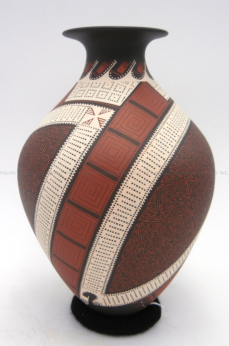 Mata Ortiz handmade and hand painted multi-pattern polychrome vase by Trini Silveira