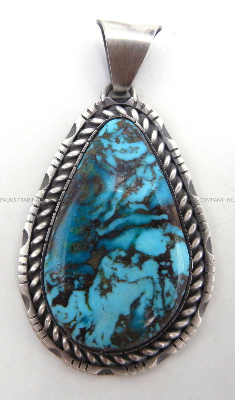 Navajo tear drop shaped turquoise and sterling silver pendant by Walter Vandever