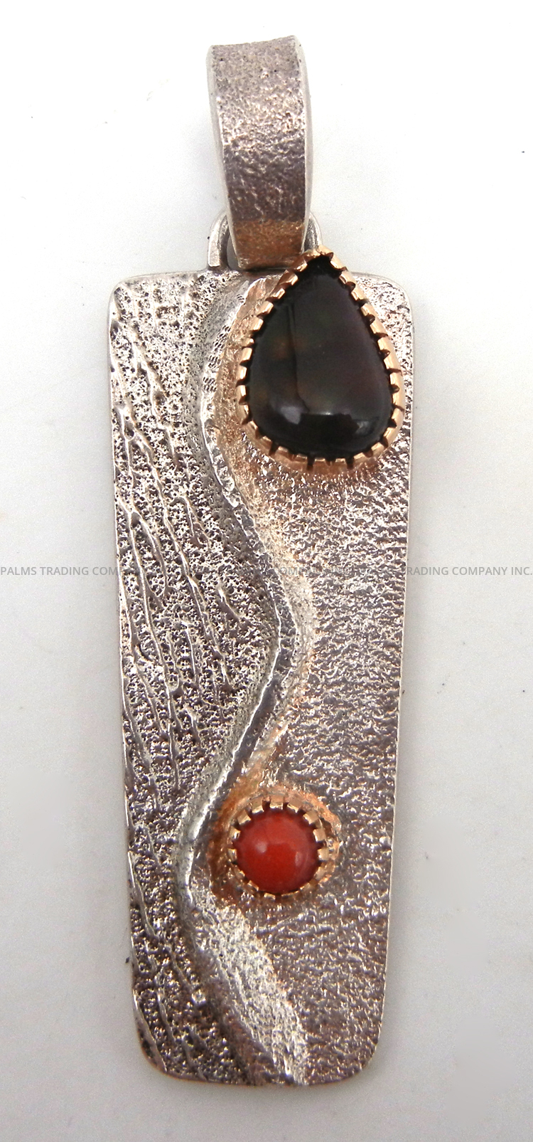 Navajo vintage tufa cast sterling silver pendant with fire agate, coral and 14k gold