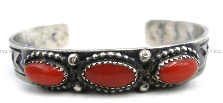 Navajo coral and sterling silver row cuff bracelet by John Lucio