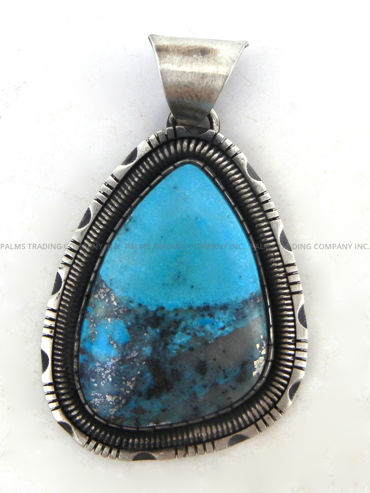 Navajo blackjack turquoise and sterling silver pendant by Walter Vandever