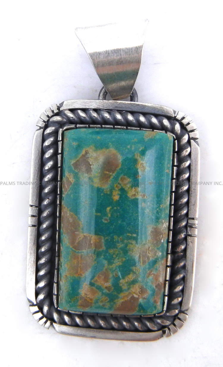 Navajo Royston turquoise and sterling silver pendant by Walter Vandever