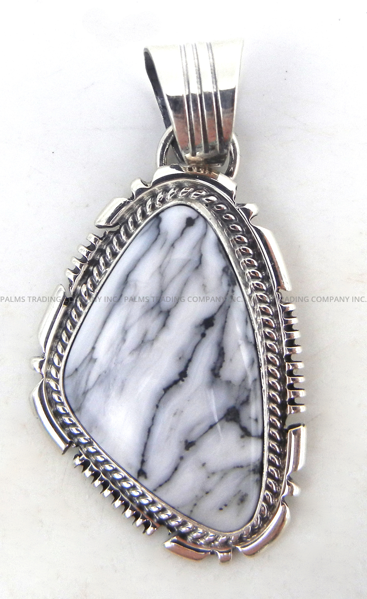 Navajo white buffalo and sterling silver pendant by Will Denetdale