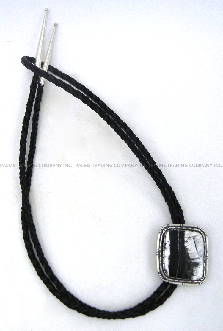 Navajo white buffalo and sterling silver bolo tie by Walter Vandever