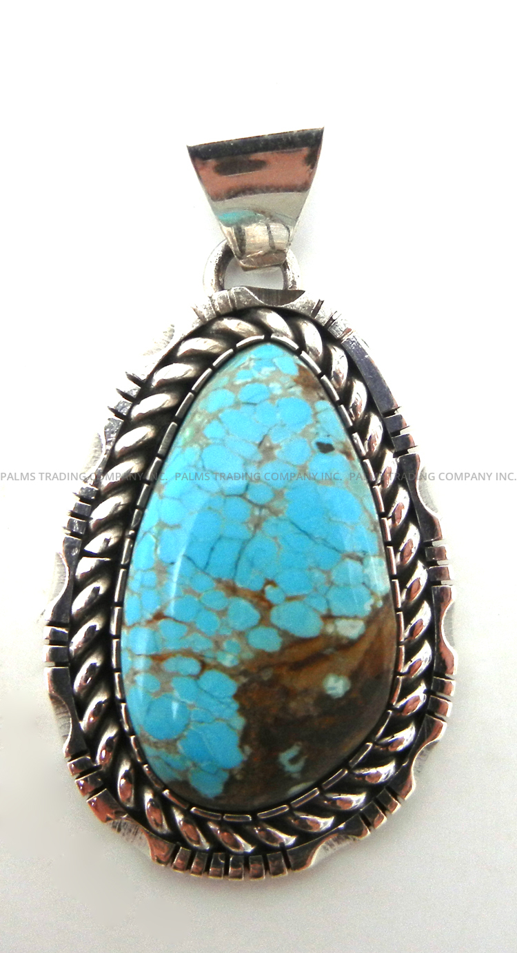 Navajo turquoise and sterling silver pendant by Walter Vandever
