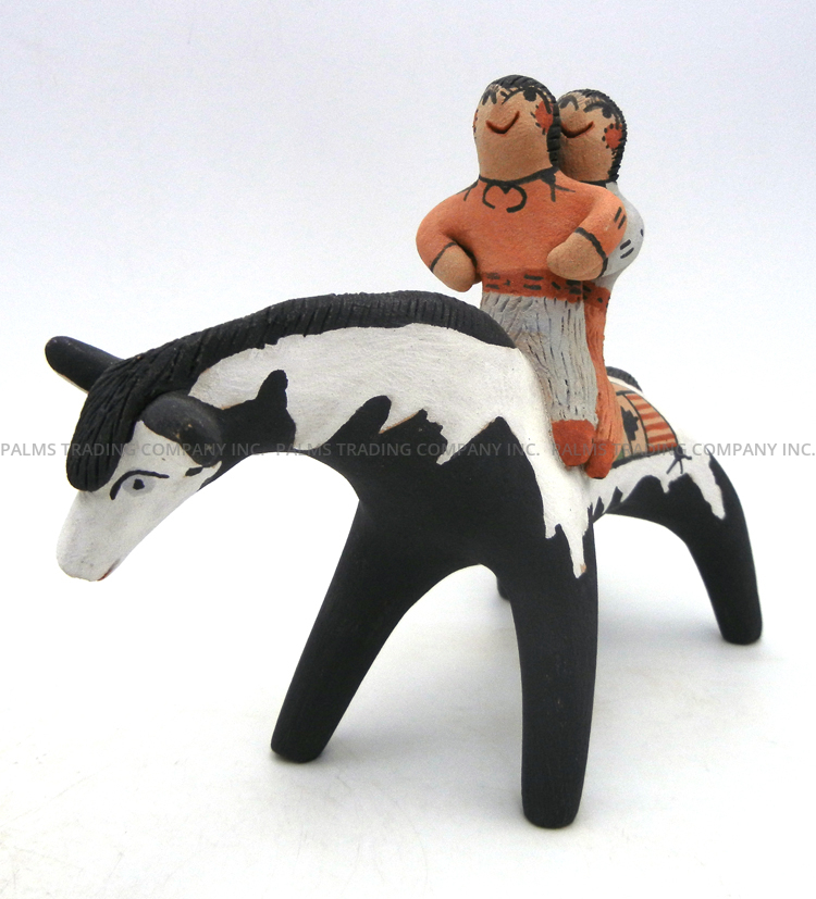 Jemez handmade and hand painted horse figurine with two children by Clifford Fragua
