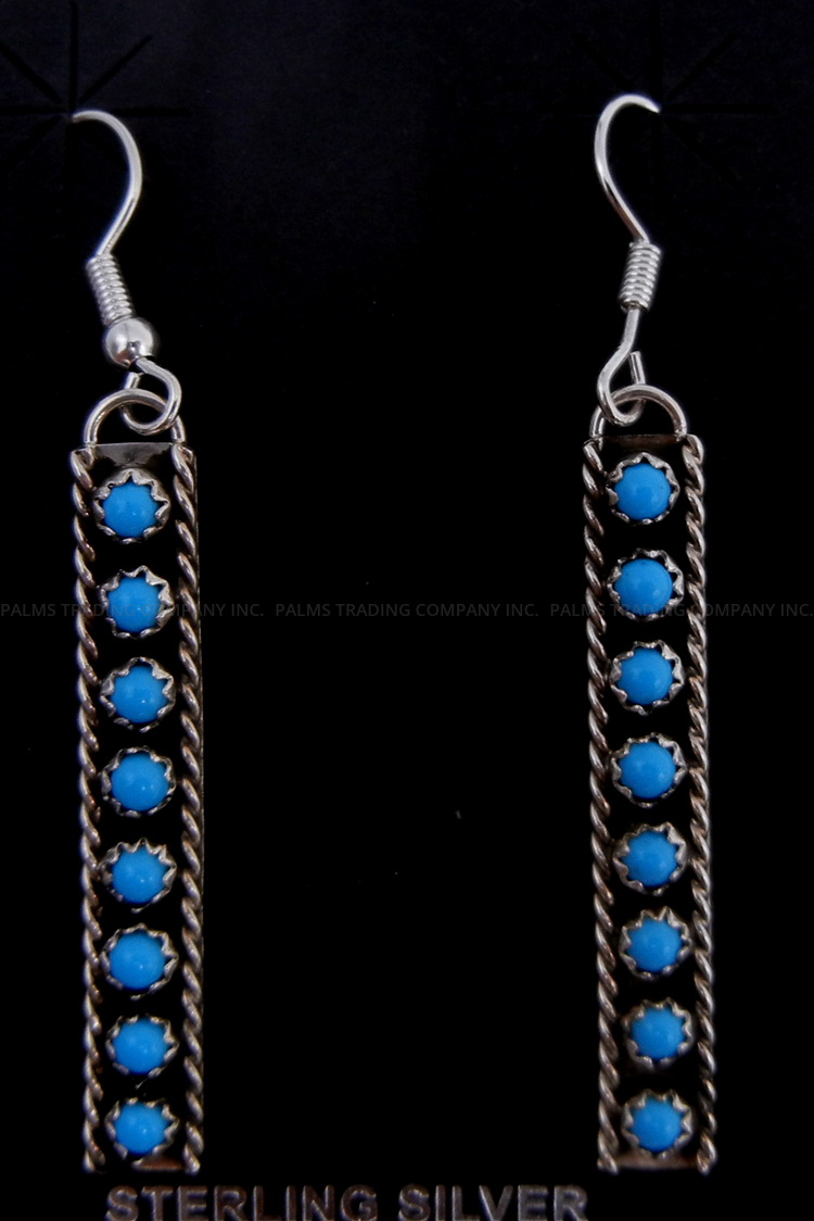 Navajo turquoise and sterling silver row earrings by Chester Charley