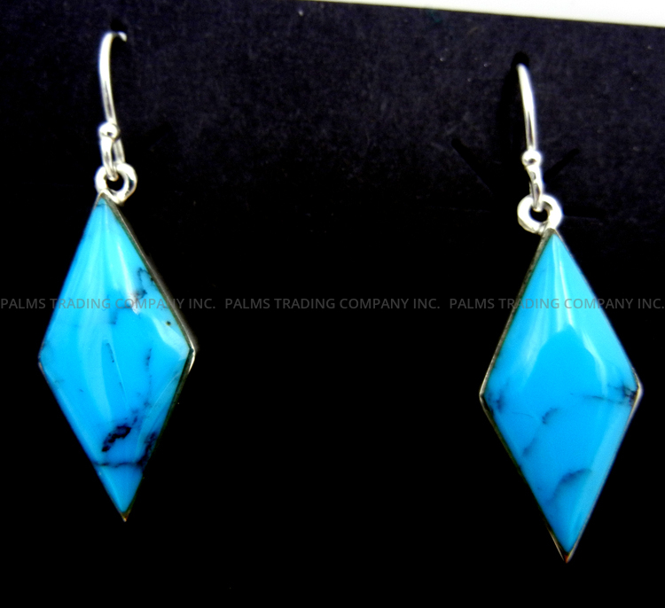 Navajo turquoise and sterling silver diamond shaped dangle earrings by Cathy Webster