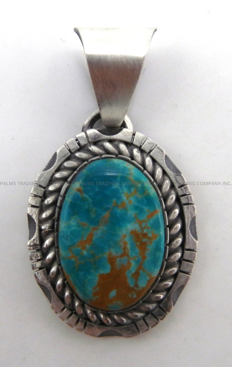 Navajo small turquoise and sterling silver pendant by Walter Vandever