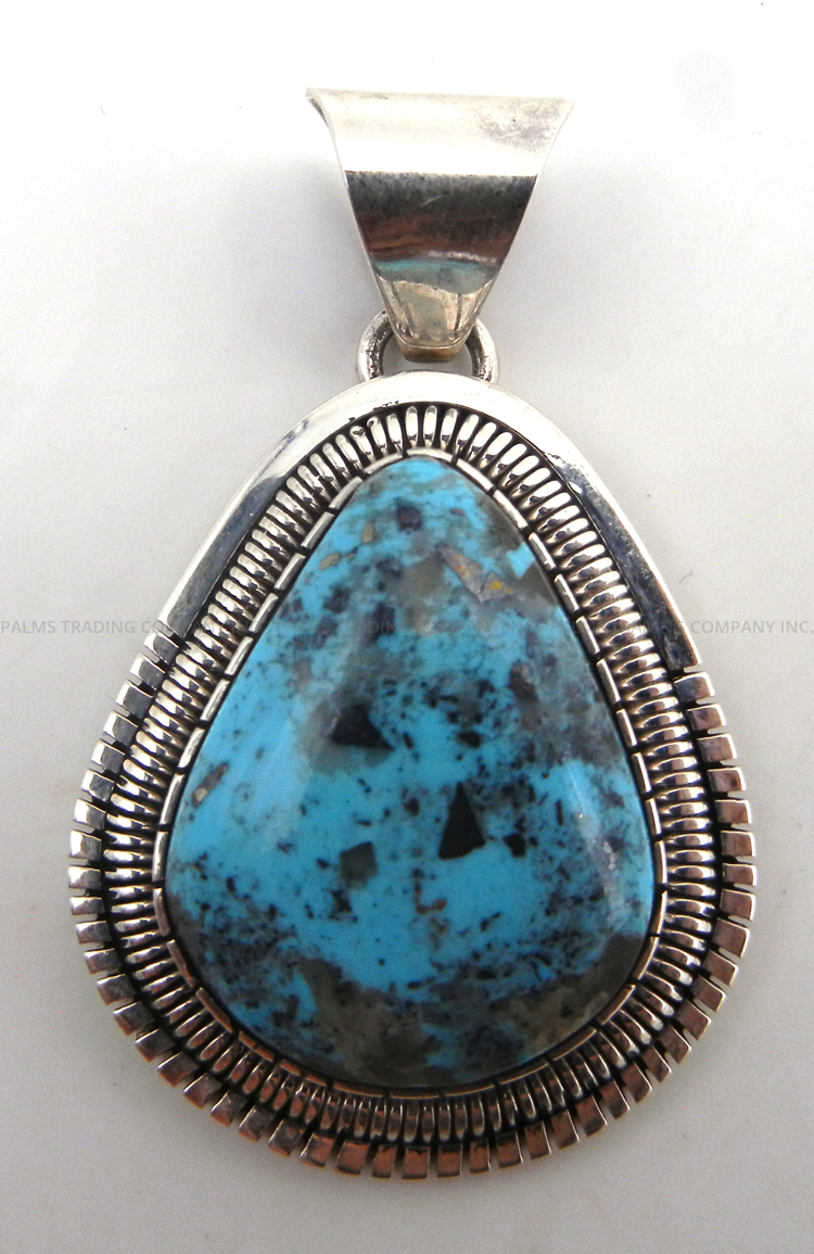 Navajo turquoise and sterling silver pendant by Walter Vandever