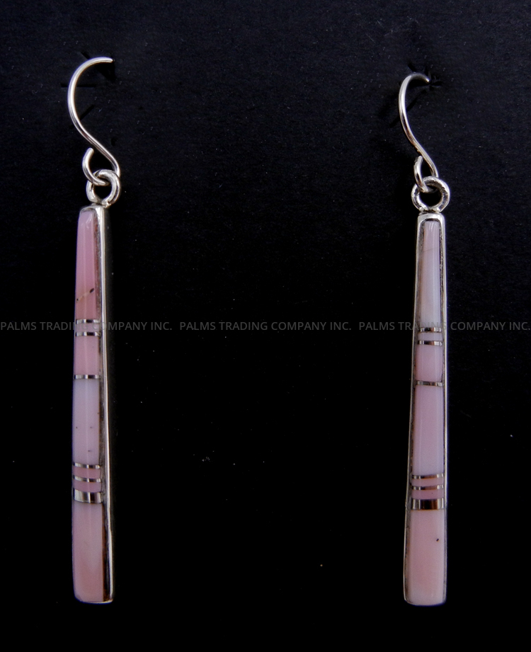 Navajo pink conch and sterling silver channel inlay dangle earrings by Rick Tolino