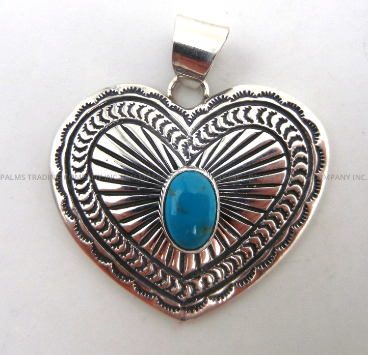 Navajo sterling silver and turquoise concho style heart pendant by June Delgarito