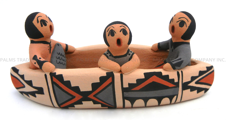 Jemez handmade and hand painted canoe figurine with three children and fish by Chrislyn Fragua