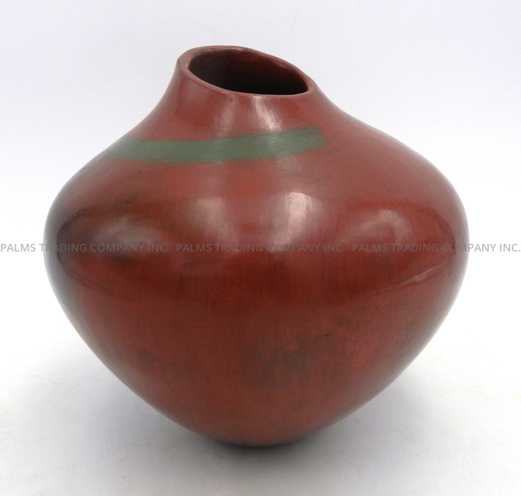 Navajo handmade pine pitch jar with sloped rim by Alice Cling