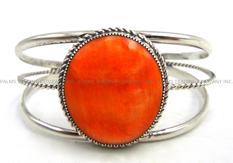 Navajo orange spiny oyster and sterling silver cuff bracelet