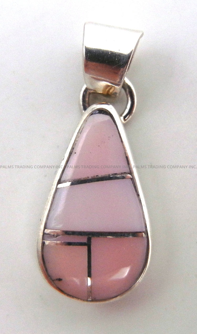 Navajo pink conch and sterling silver inlay pendant by Calvin Begay