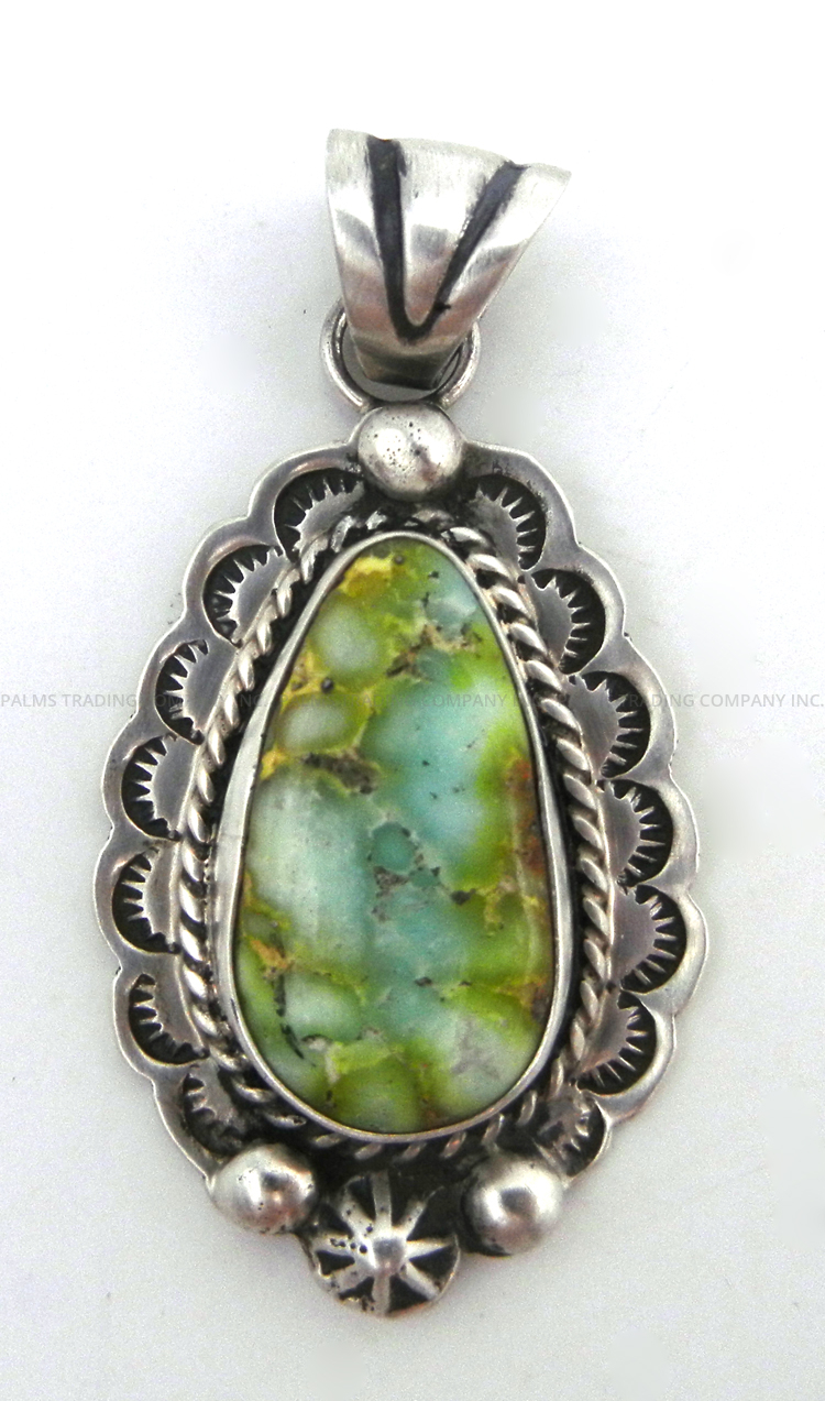 Navajo sonoran gold and sterling silver pendant