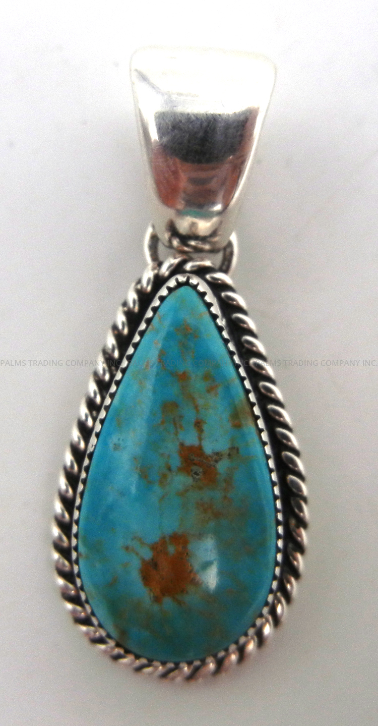 Navajo tear drop turquoise and sterling silver pendant