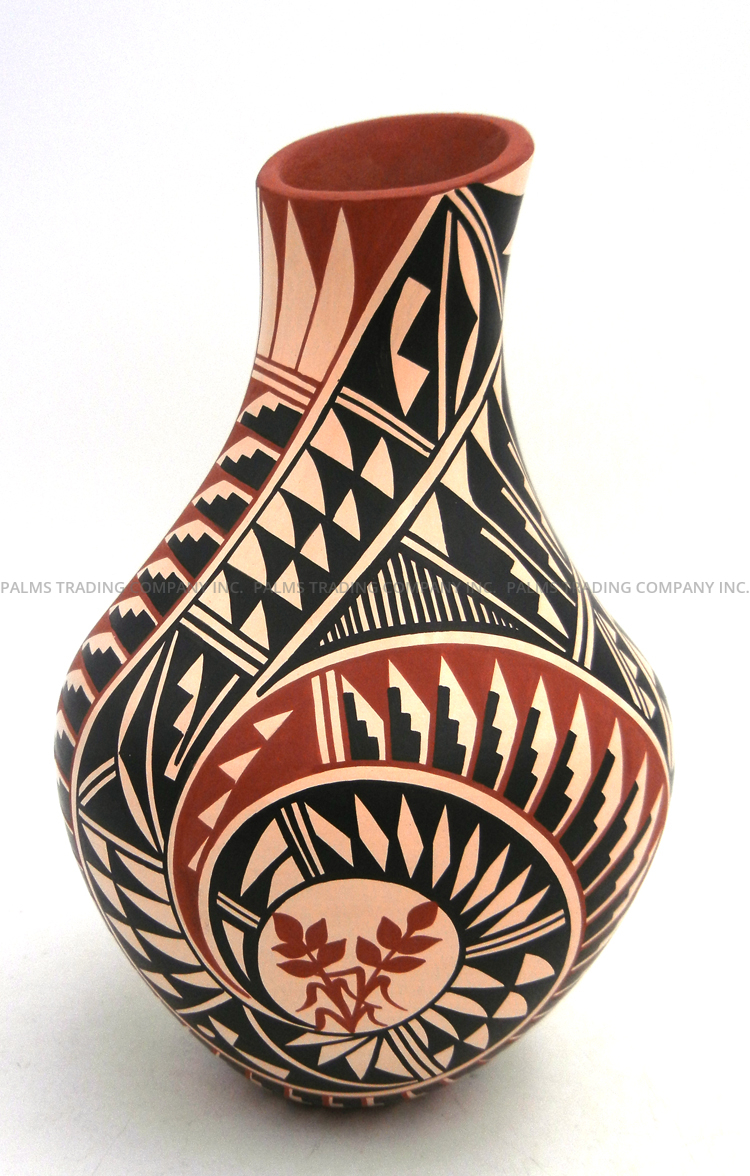 Jemez handmade and hand painted multi-pattern polychrome jar with sloped rim by Geraldine Sandia