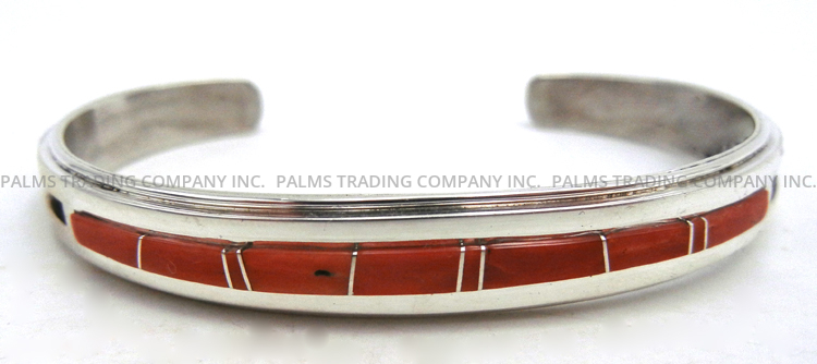Navajo coral and sterling silver channel inlay cuff bracelet by Wilbert Muskett