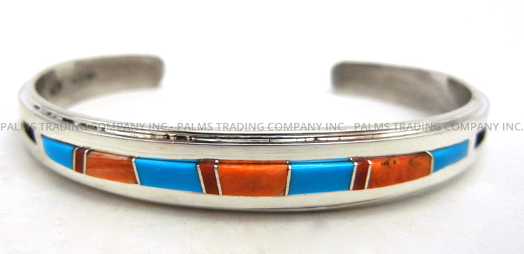 Navajo multi-stone and sterling silver channel inlay cuff bracelet by Wilbert Muskett