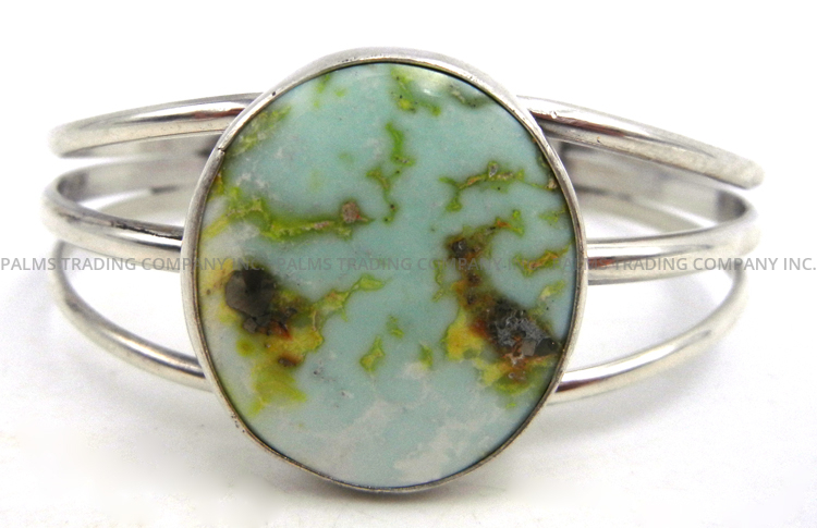 Navajo sonoran gold turquoise and sterling silver cuff bracelet