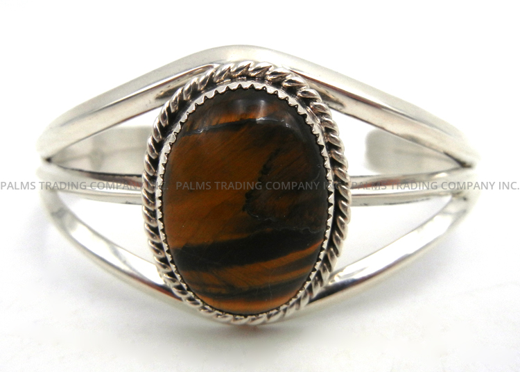 Navajo tiger eye and sterling silver cuff bracelet by Elroy Chavez
