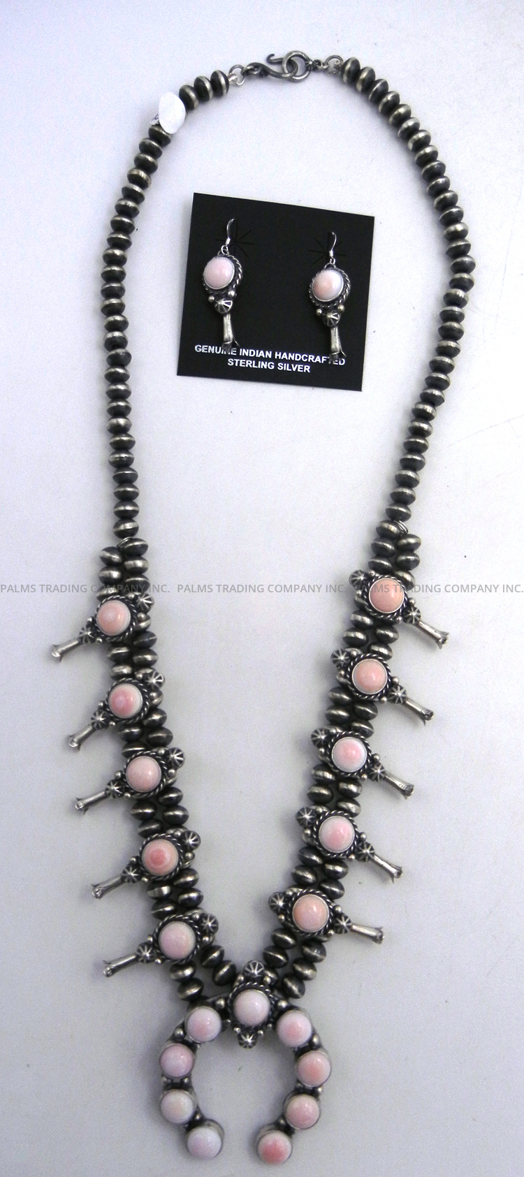Navajo pink conch and sterling silver squash blossom necklace and earring set