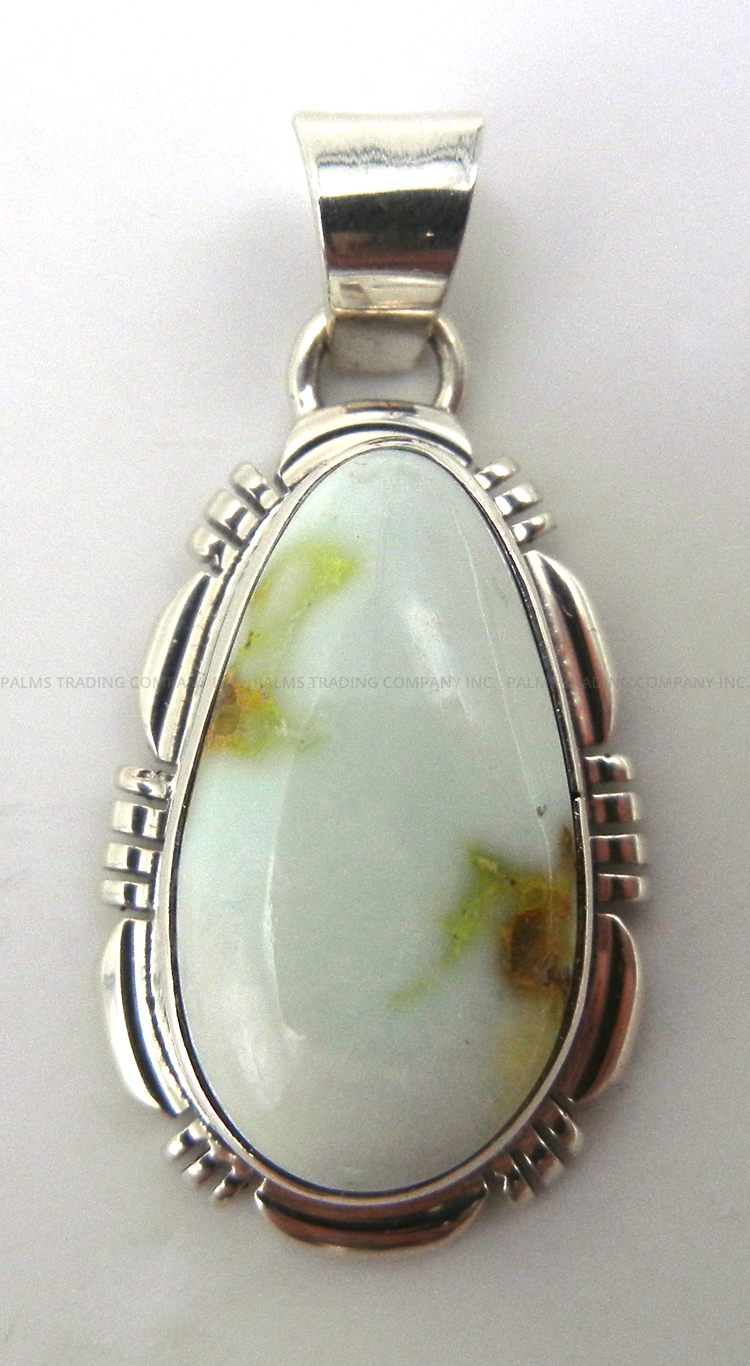 Navajo small sonoran gold turquoise and sterling silver pendant