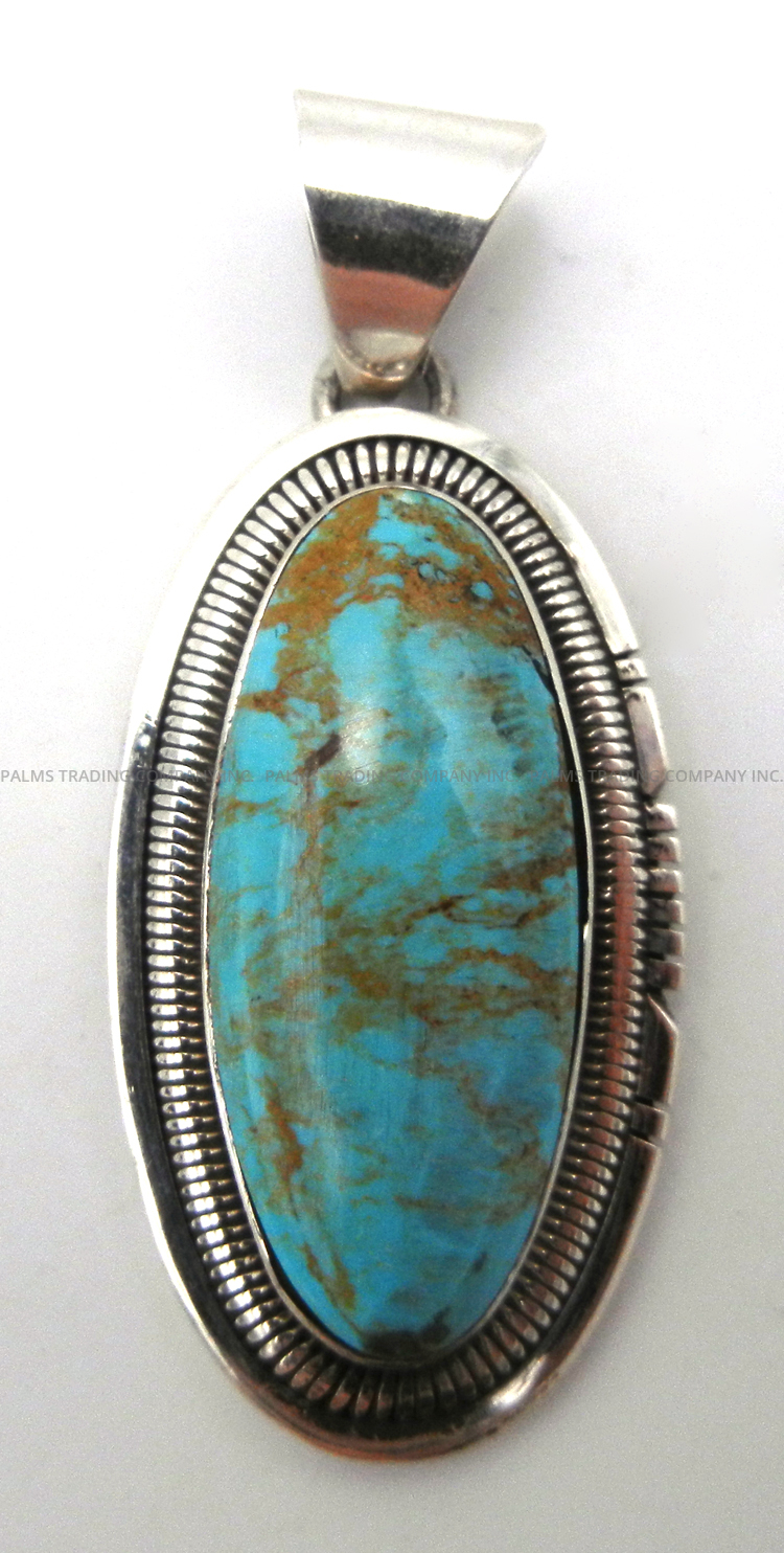 Navajo turquoise and sterling silver pendant by Walter Vandever