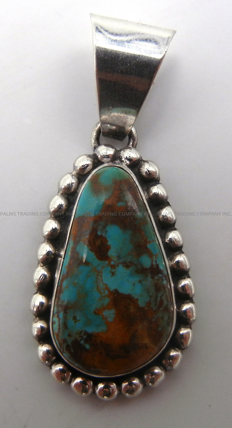 Navajo small turquoise and sterling silver pendant by Micah Nelson