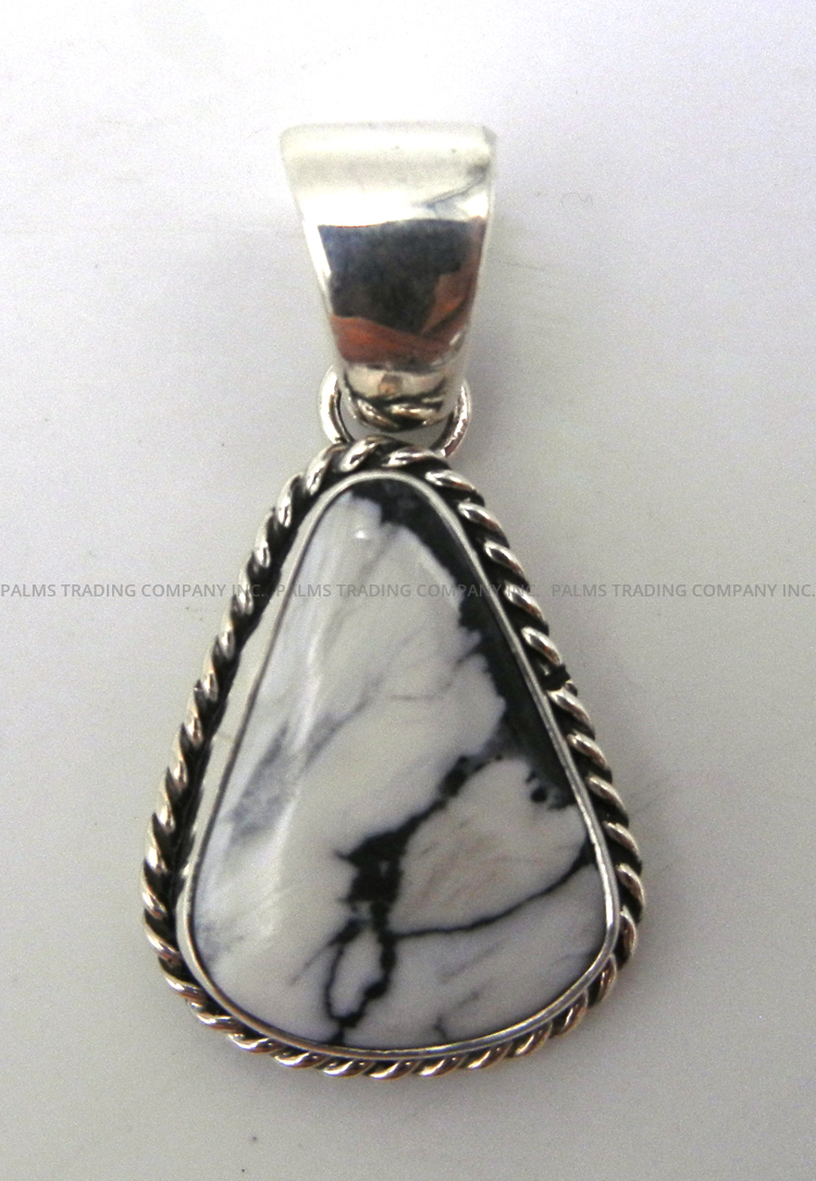 Navajo small white buffalo and sterling silver pendant