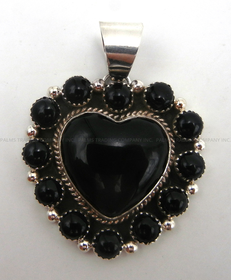 Navajo onyx and sterling silver heart cluster pendant by Delbert Delgarito