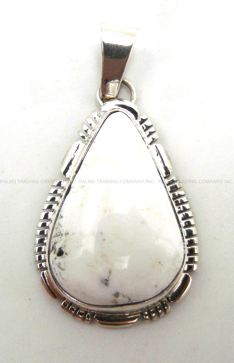 Navajo white buffalo and sterling silver pendant