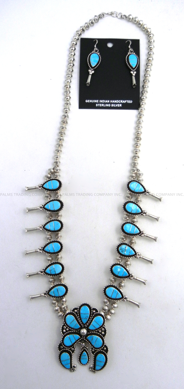 Zuni turquoise and sterling silver inlay squash blossom necklace and earring set by Faye Lowsayatee
