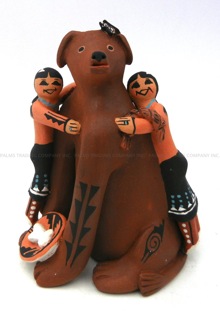 Jemez seated dog figurine with two children by Carol Lucero Gachupin