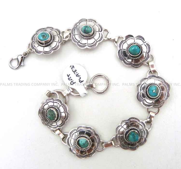 Navajo concho style sterling silver and turquoise link bracelet by Art Platero