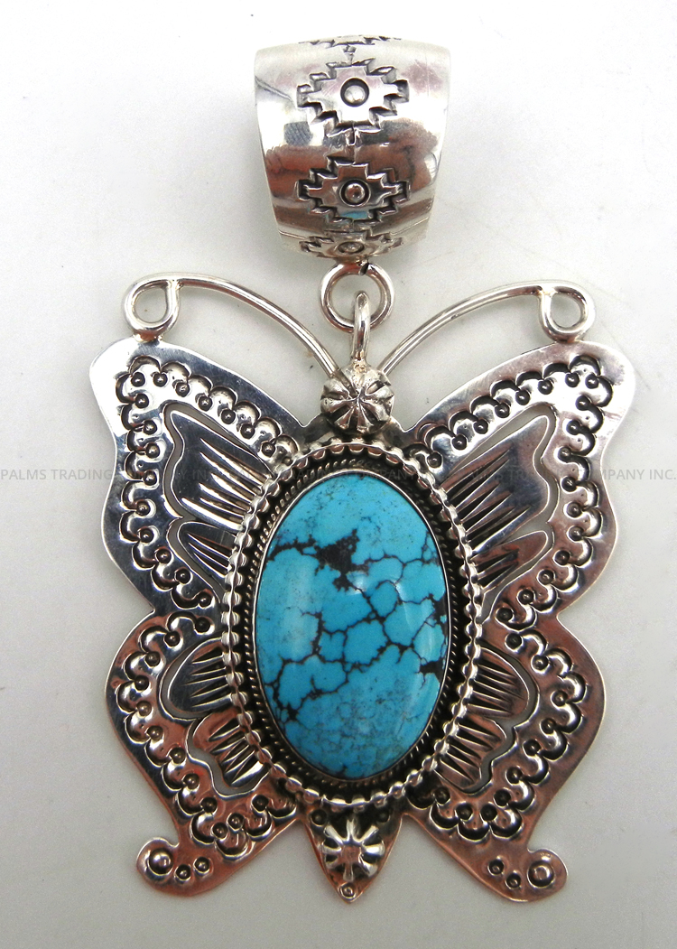 Navajo large turquoise and sterling silver butterfly pendant by Wilford Begay