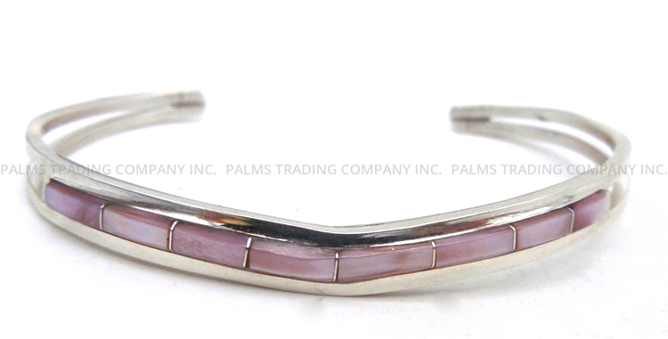 Zuni pink mussel shell and sterling silver channel inlay cuff bracelet by Anson and Leticia Wallace