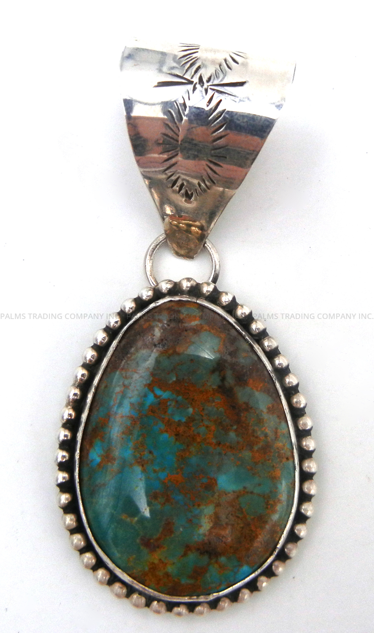 Navajo green turquoise and sterling silver pendant by Leonard Platero, Jr. and Racquel Hurley